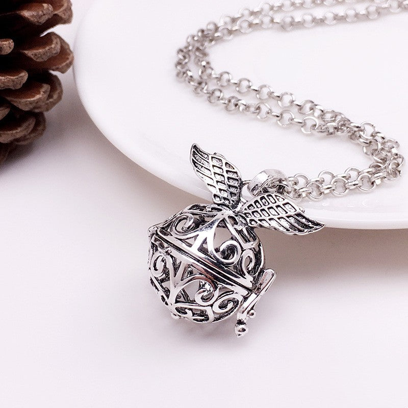 Angel Wing Metal Sphere Holder Necklace Perfume Pendant Sweater Chain